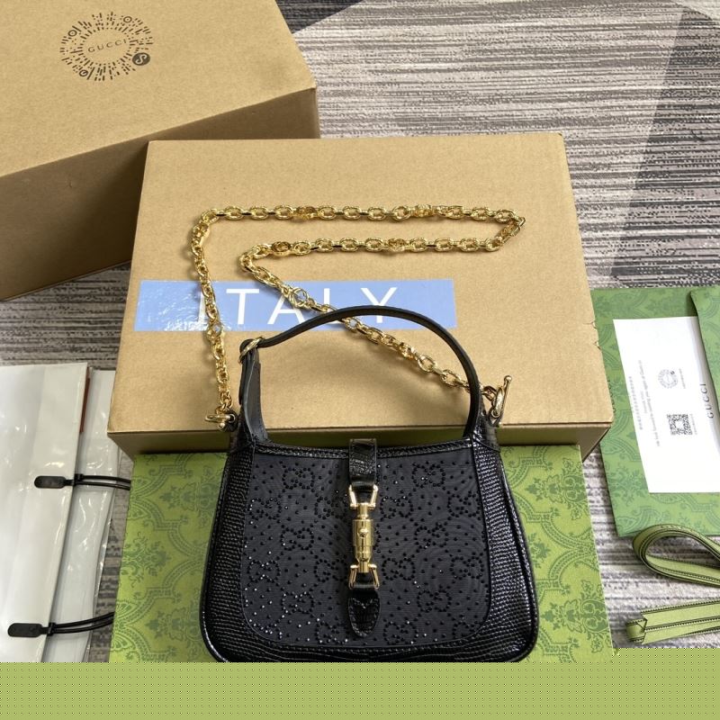 G*u*i top handle bags